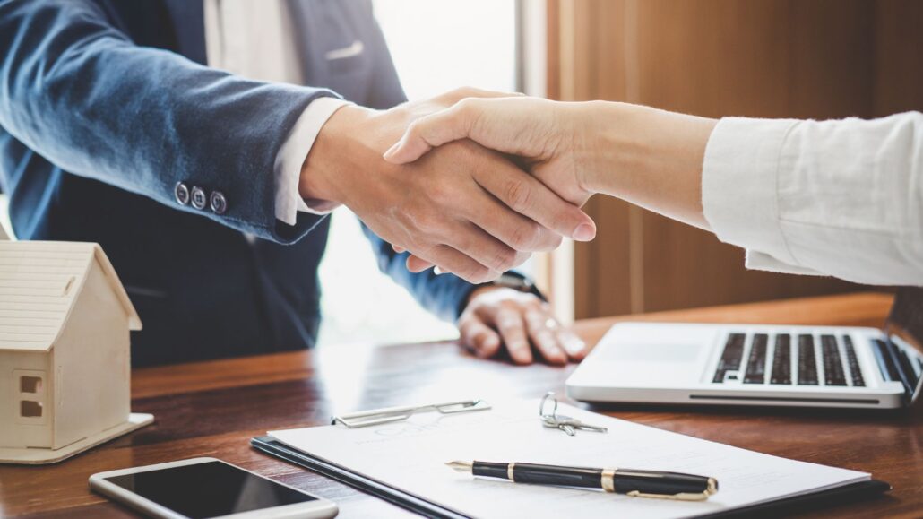 handshake | Specialized Memphis Close up of two people shaking hands across a desk