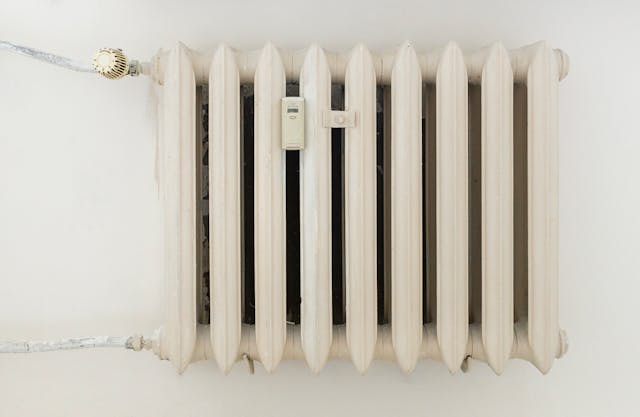 pexels-patrycja-grobelny-57039264-12034871 | Specialized Memphis White steel rib radiator in a new bright renovated room in apartment or home