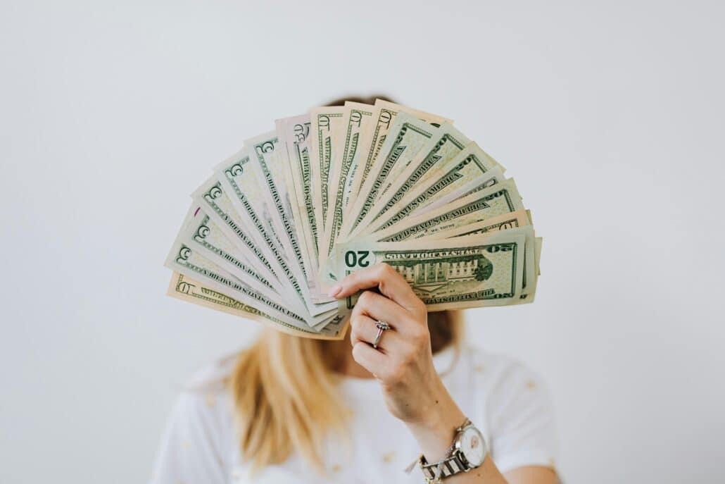 pexels-karolina-grabowska-4968660 | Specialized Memphis fanned out cash in front of a woman's face